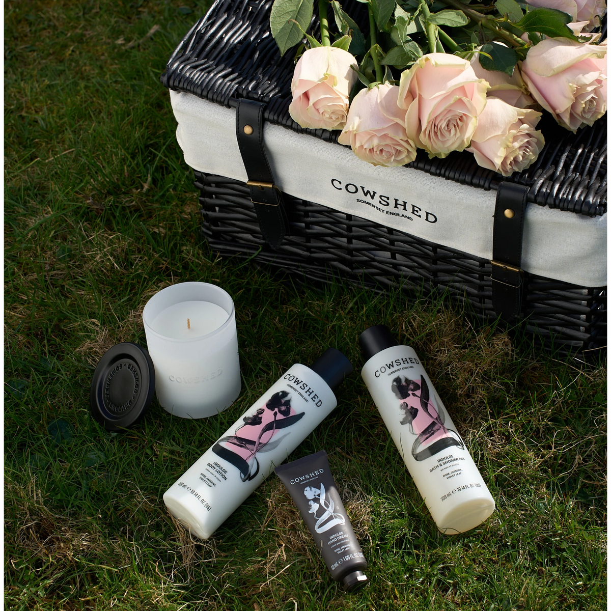 Cowshed Indulge Candle lifestyle picnic setting