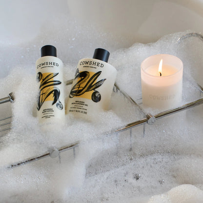 Cowshed Replenish Candle bath lifestyle image